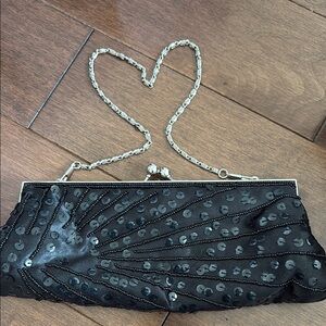 $5 WILL DONATE / CLEAROUT will be donating Elegant Black Sequin Clutch